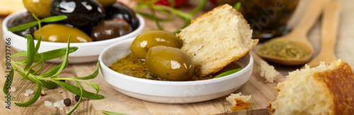 Bread with olive oil. Panoramic image. Selective focus.