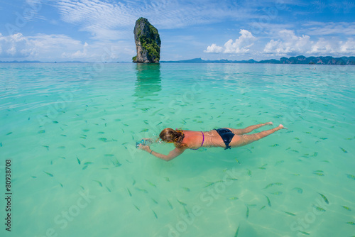 Fototapeta Naklejka Na Ścianę i Meble -  Woman swimming with snorkel, Andaman Sea
