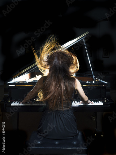Obraz na plátne pianist performing on a grand concert piano