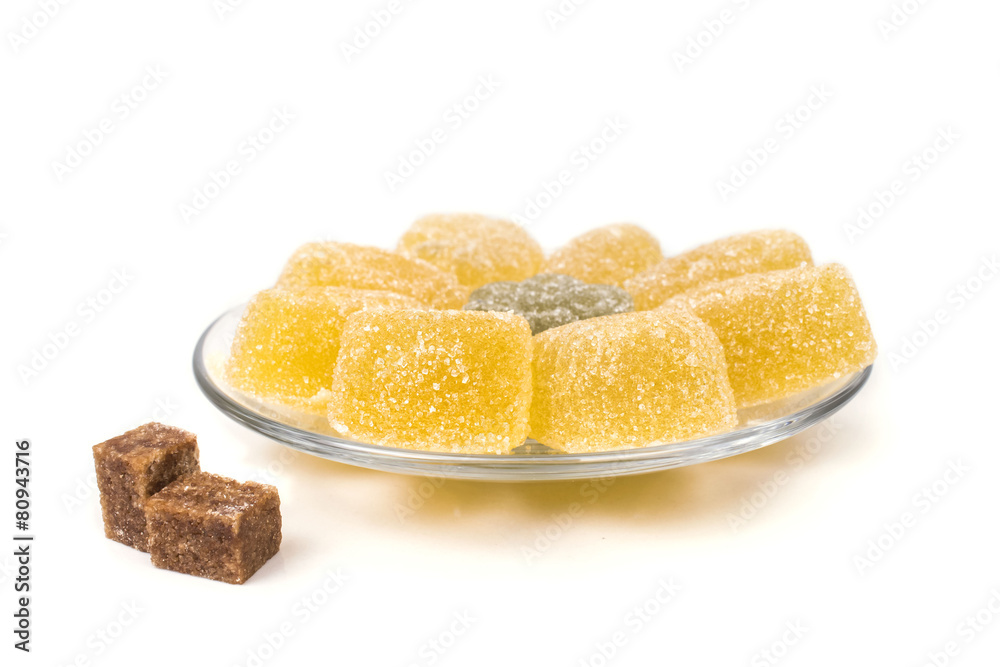 on a plate with slices of sweet tasty marmalade on a plate with slices of sweet tasty marmalade