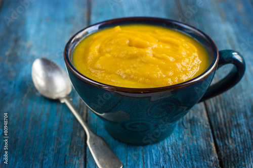 pumpkin soup on a bowl