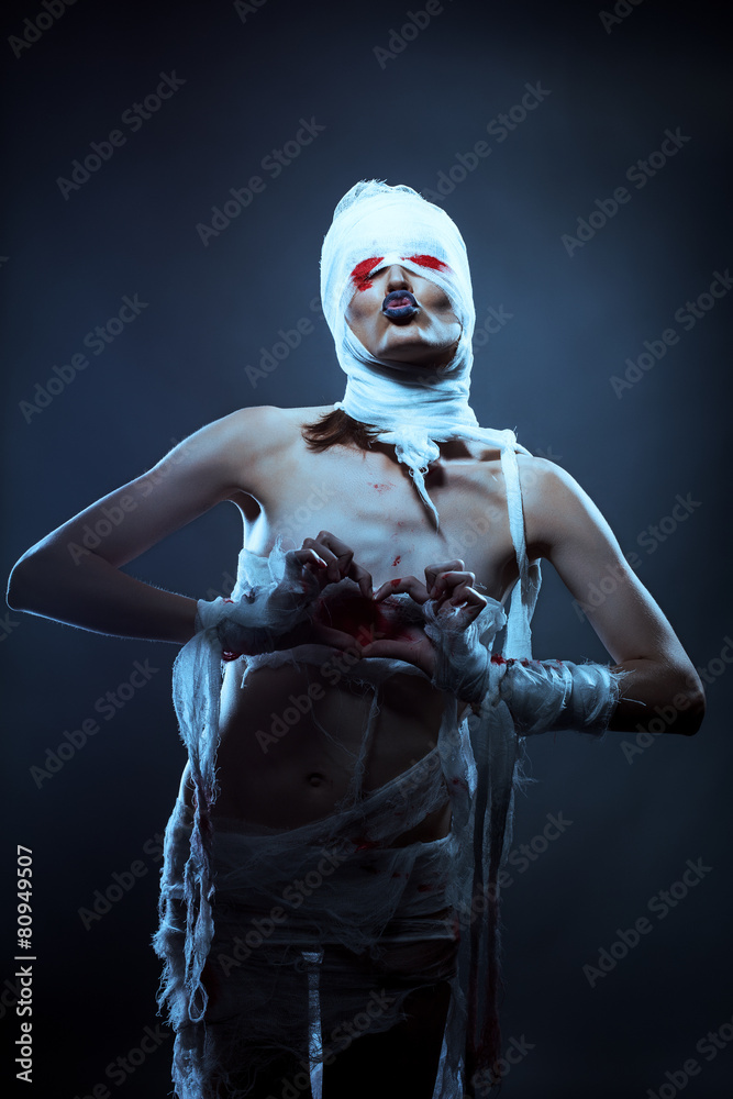 Naklejka premium Image of strange looking girl dressed as zombies