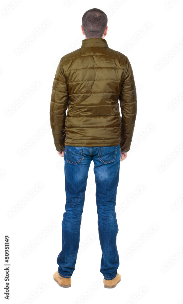 Back view of handsome man in blue windcheater looking. Back view of handsome man in blue windcheater looking.