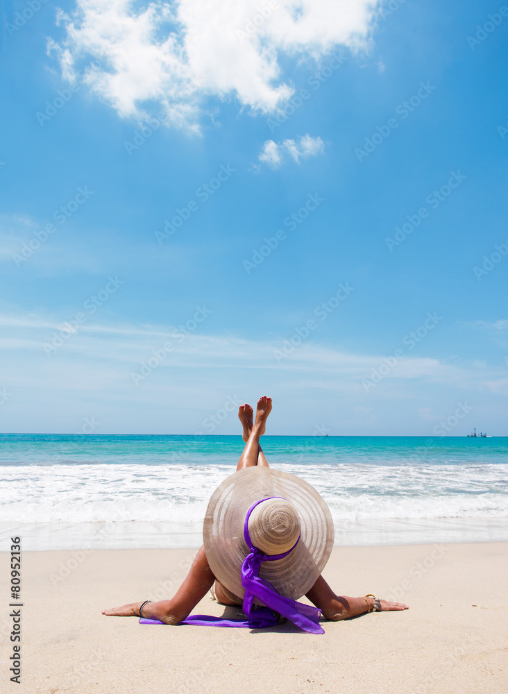 Fototapeta premium Beautiful woman on the beach.