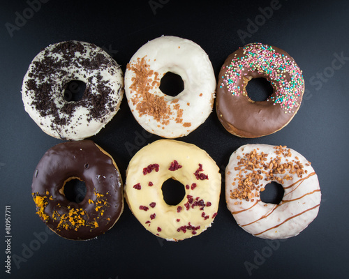 doughnuts on black table