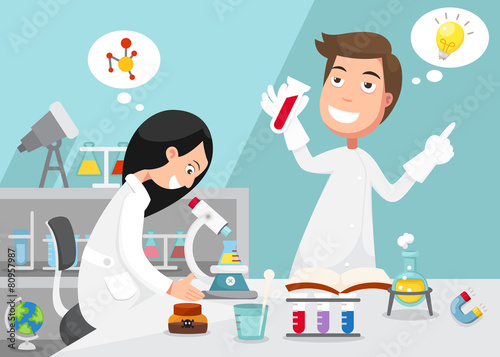 Scientists doing experiment surrounded by lab equipment