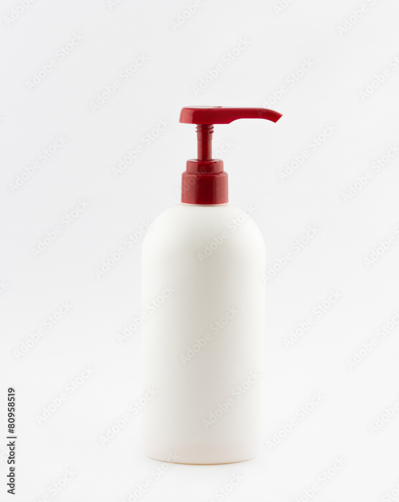 White plastic tube of shampoo with red batcher White plastic tube of shampoo with red batcher