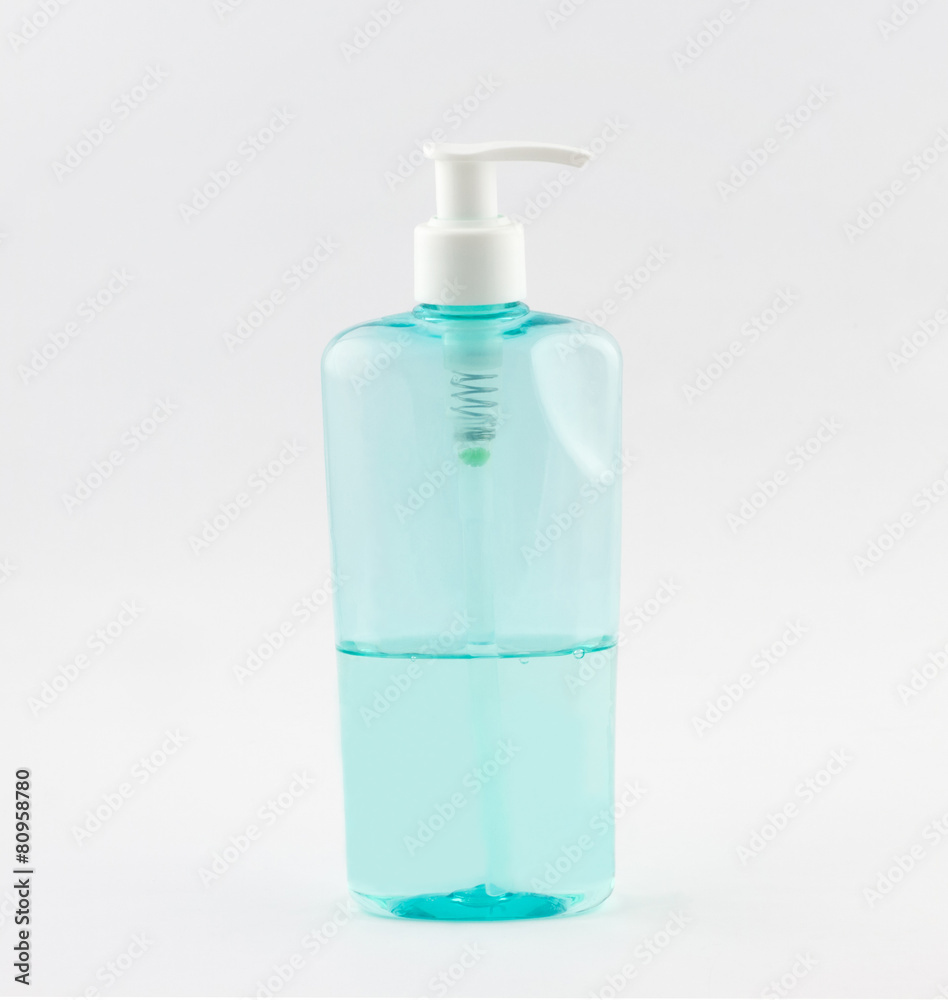 Plastic tube of shower gel with batcher on white background Plastic tube of shower gel with batcher on white background