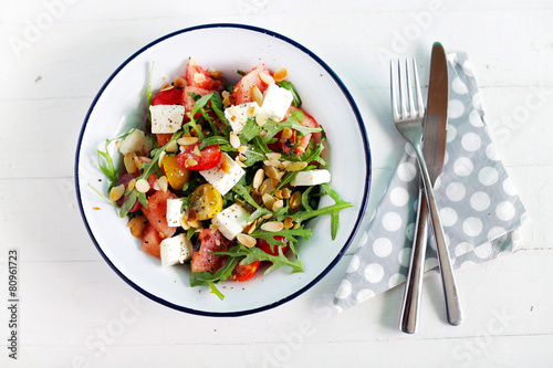Watermelon salad with feta cheese and arugula, toasted almonds