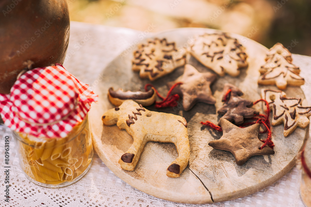 Fototapeta premium Christmas homemade gingerbread cookies on wooden table