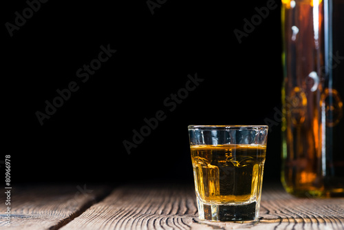 Shot glass with Whiskey photo