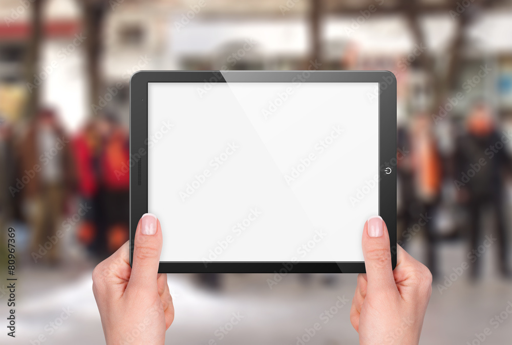 Tablet with blank screen in hand