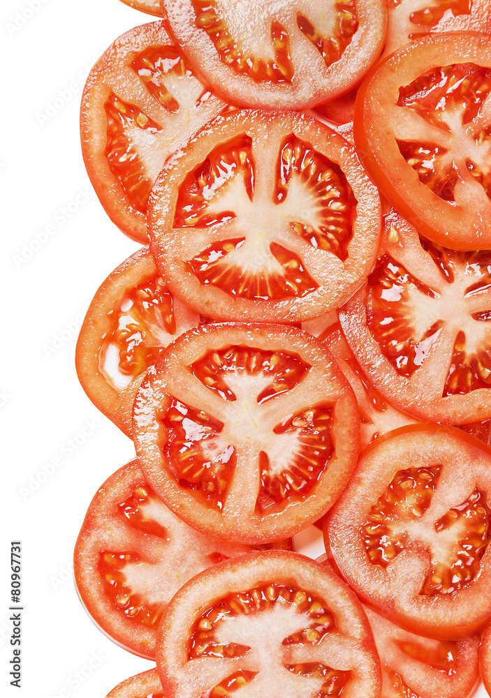 Fresh background with slices of tomato isolated