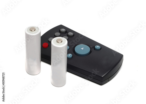 miniature remote controls on a white background