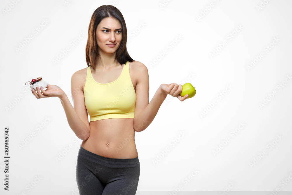 Diet. Dieting concept. Healthy Food. Beautiful Young Woman choos Diet. Dieting concept. Healthy Food. Beautiful Young Woman choos