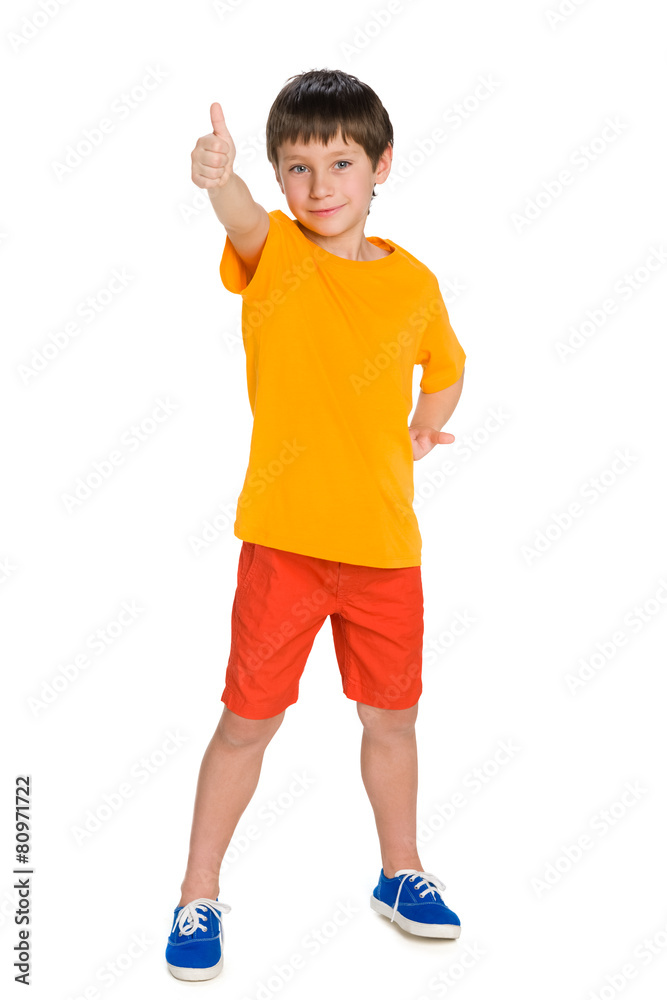 Cute young boy with his thumb up Cute young boy with his thumb up