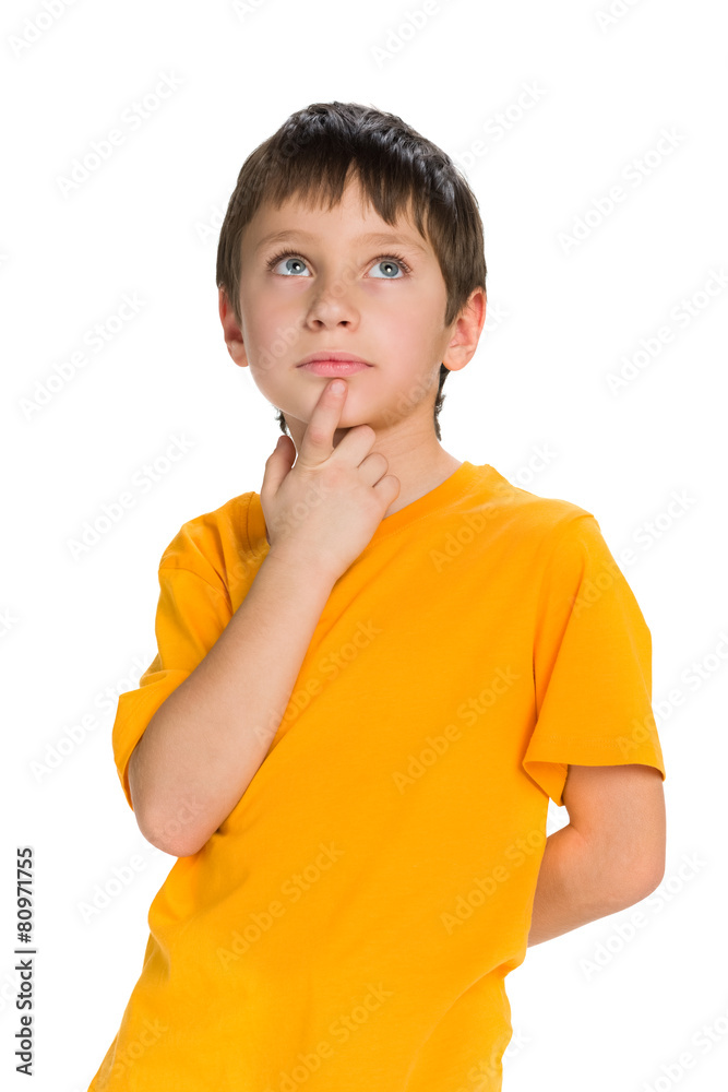 Thoughtful boy looks up Thoughtful boy looks up