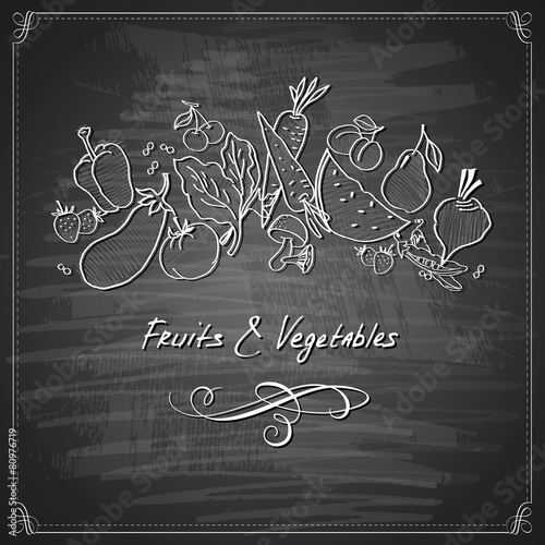Vegetables and fruits on chalkboard styled background
