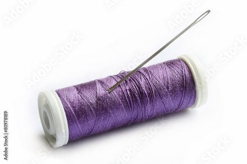 Spool of thread and needle