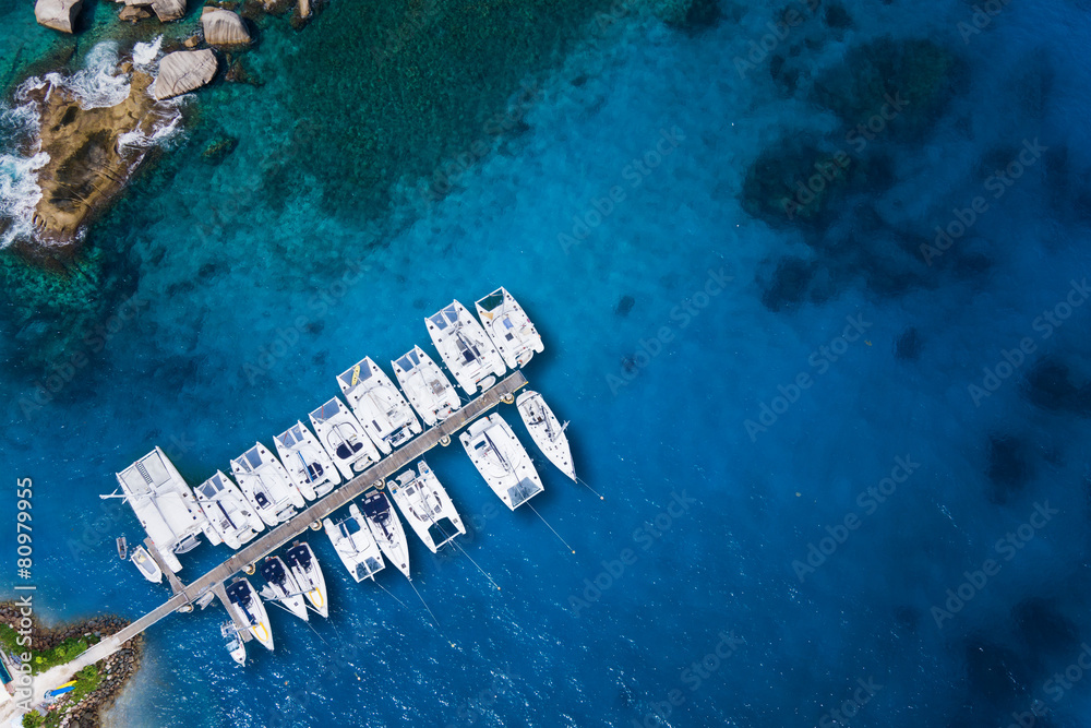 Fototapeta premium Amazing view to Yachts in harbor - Drone view. birds eye angle