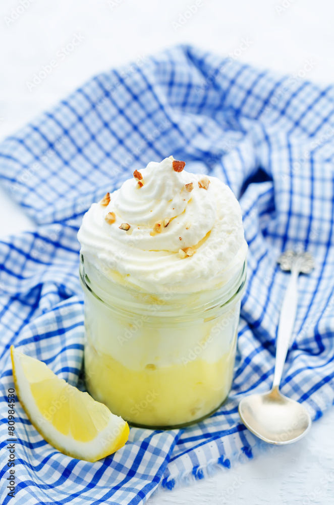 layered dessert with lemon cream, ice cream and whipped cream layered dessert with lemon cream, ice cream and whipped cream