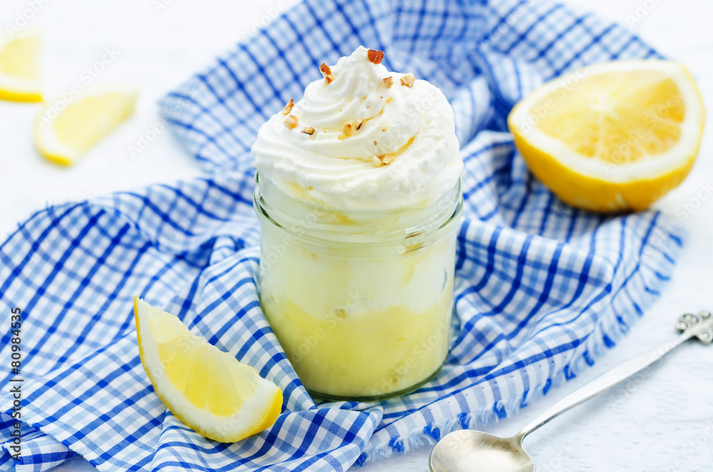 layered dessert with lemon cream, ice cream and whipped cream layered dessert with lemon cream, ice cream and whipped cream