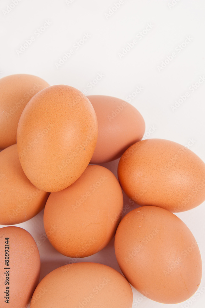 Chicken eggs on white paper background Chicken eggs on white paper background