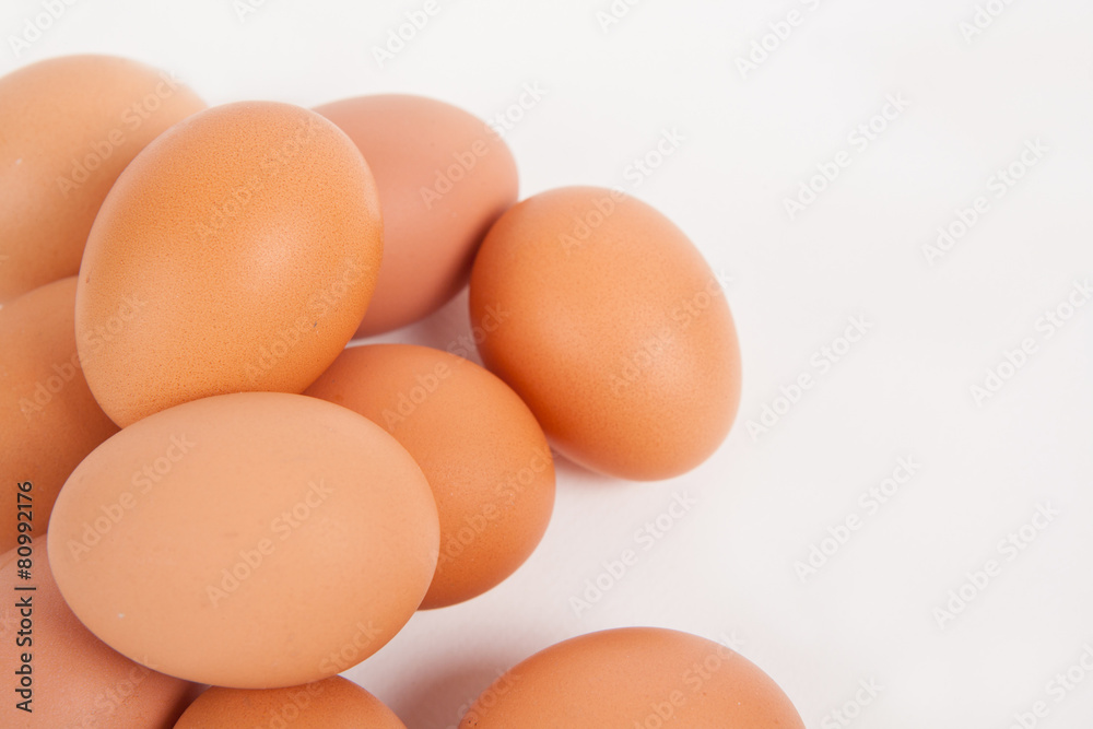 Chicken eggs  on white paper background