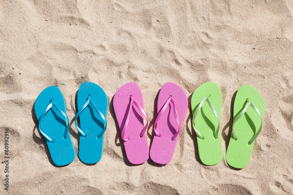 Fototapeta premium Three Pairs Of Flip-flops