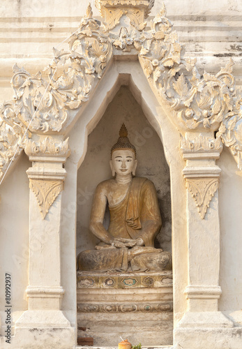 Buddha sculpture inside pagoda