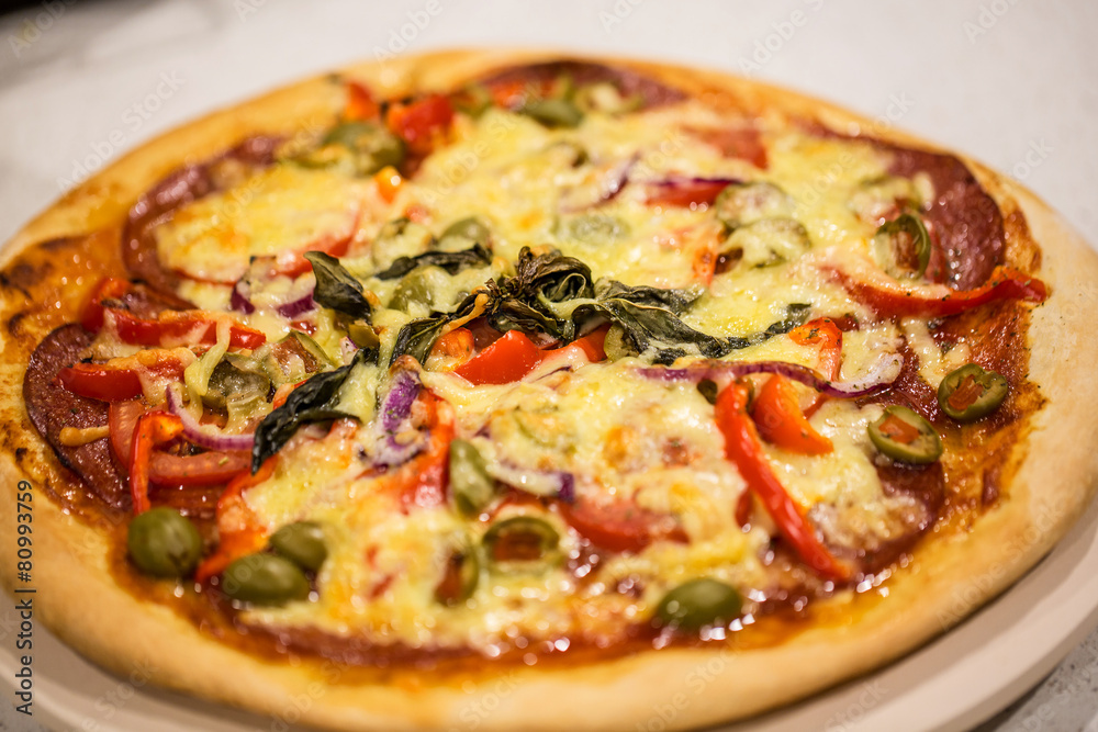 Homemade pizza on white table