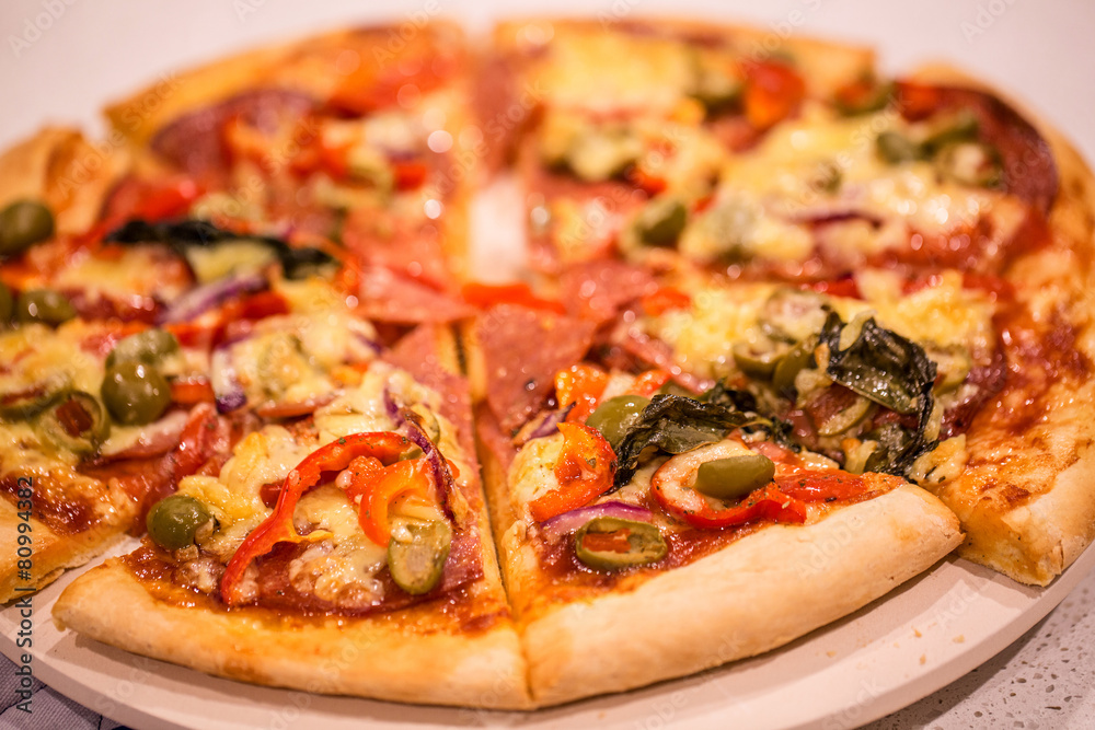 Homemade pizza on white table