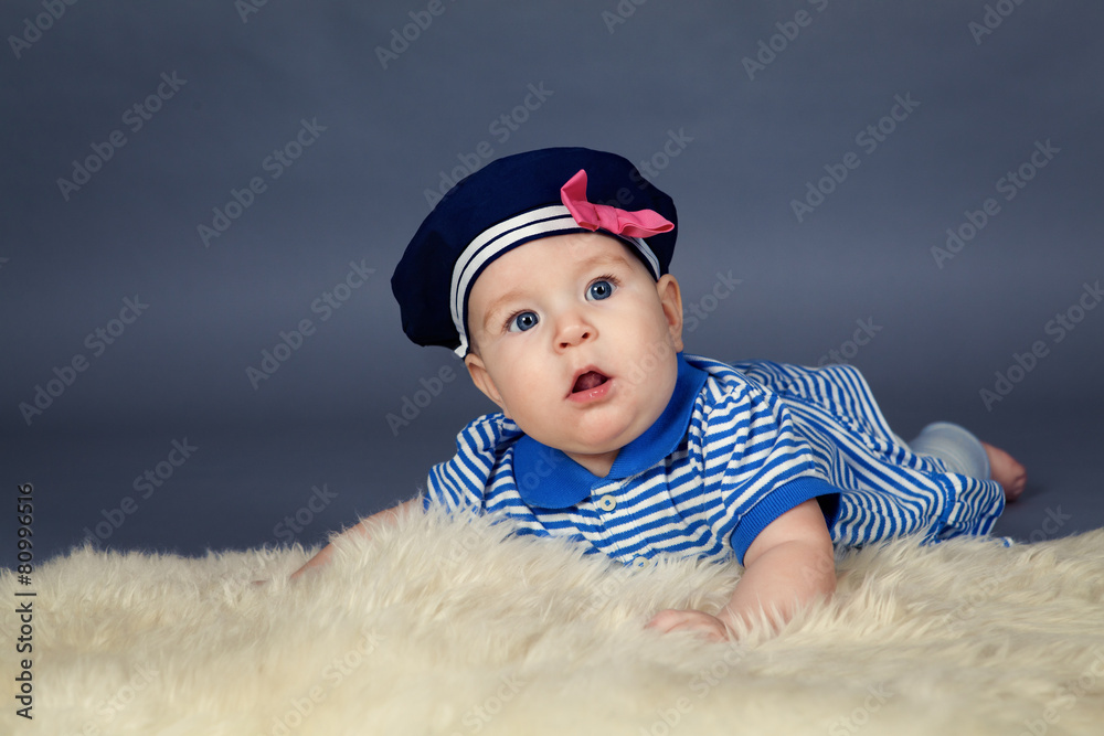 Portrait of happy cute baby girl in sailor dress Portrait of happy cute baby girl in sailor dress