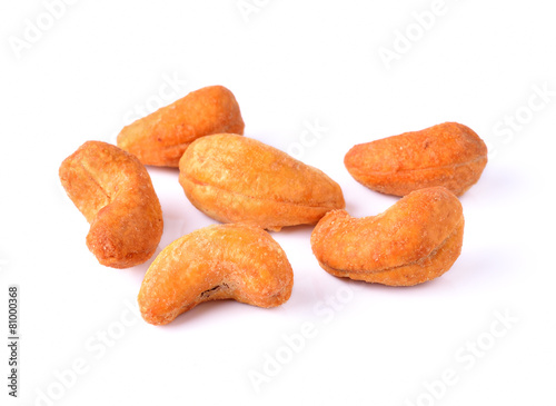 salted cashew nuts on white background