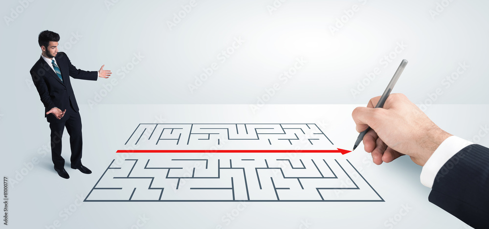 Business man looking at hand drawing solution for maze Business man looking at hand drawing solution for maze