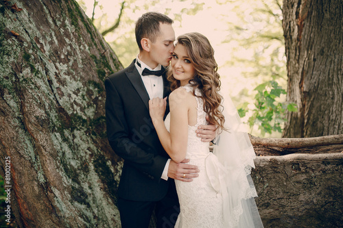 Wedding couple in the park photo