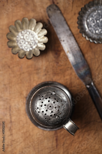 Vintage  Baking utensils - sifter, spatula, tins and moulds photo