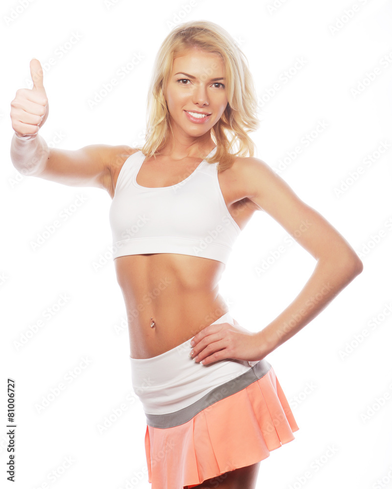 happy fitness woman showing thumb up happy fitness woman showing thumb up