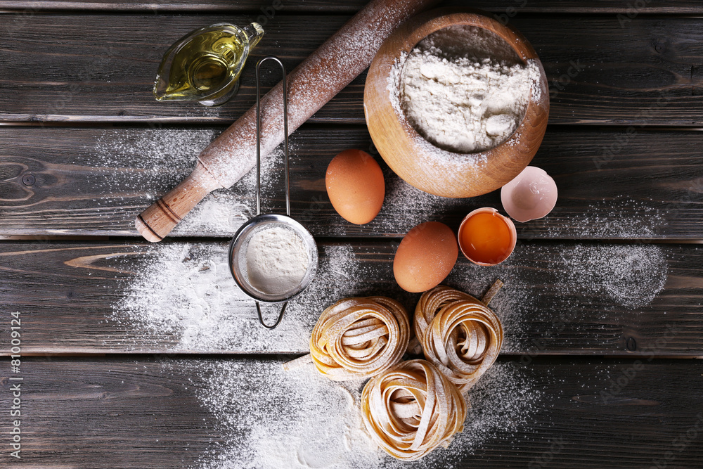 Raw homemade pasta and ingredients for pasta Raw homemade pasta and ingredients for pasta