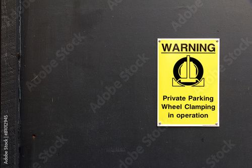 Φωτογραφία Traffic Sign: Warning - Private Parking - Wheel Clamping in Oper