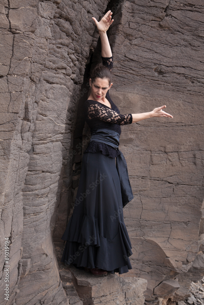 Flameco dancer in a basalt ravine