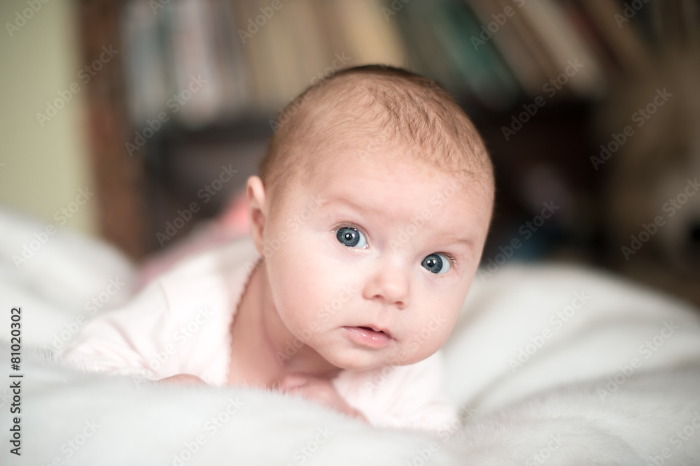 smiling baby looking at camera under a white blanket/towel smiling baby looking at camera under a white blanket/towel