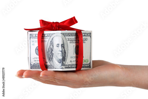 Slika na platnu Hand holding money present box isolated on white