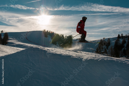 Bilde på lerret freestyle ski jump in mountain snow park, silhouette