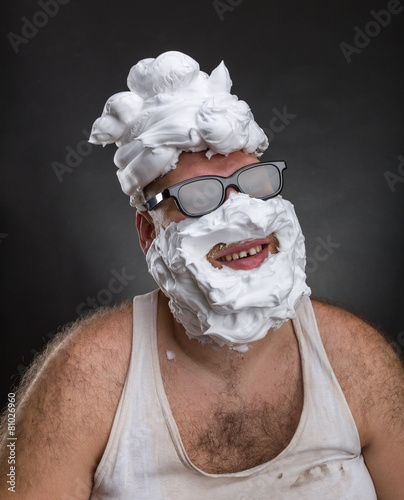 Strange smiling man in glasses