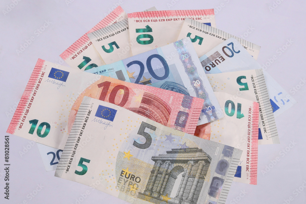 Euro notes on a plain white background. Euro notes on a plain white background.