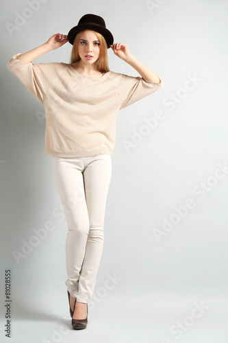 Expressive young model on gray background