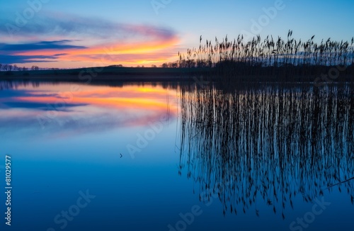 Beautiful lake with colorful sunset sky.  © milosz_g