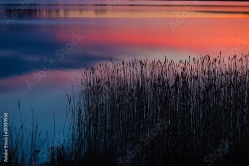 Beautiful lake with colorful sunset sky. 
