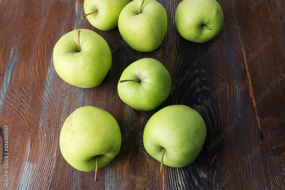 Green apples on wooden background Green apples on wooden background